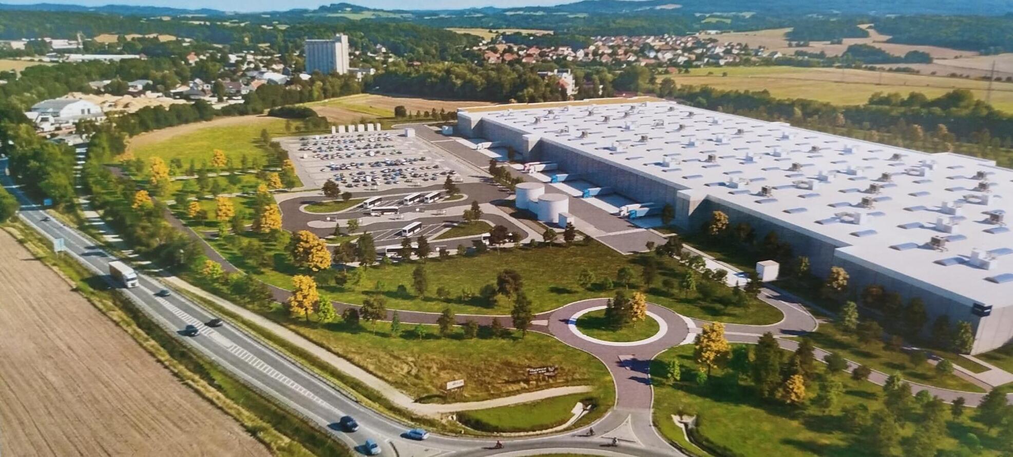 Vizualizace aktuálního konceptu jedné velké logistické haly s parkovišti a zelení, letecký pohled.